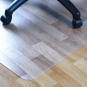 Picture showing the pvc protective floor mat being used ith your office desk chair.