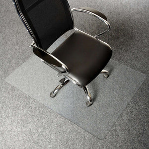 Picture showing looking down at the home office desk chair on the protective floor mat for the carpet.