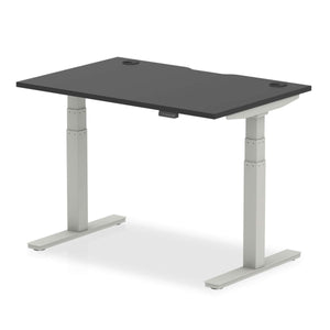 Picture of the air height adjustable desk in black top with silver legs.