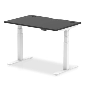 Picture of the Air Height adjustable desk , with black top and white legs.