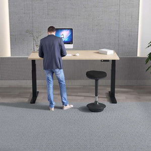 This is the maple desk in use showing you standing at the desk to work.