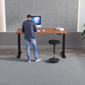 This the walnut desk being used in stand up position.