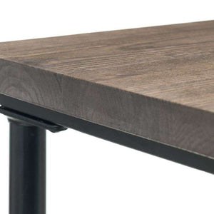 Close up of the mocha elm desk with satin  black coated steel pipe legs of the carnegie pipe  mocha elm home office desk.