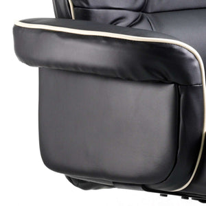 Close up of the wide gullwing arms of the chelsea leather executive chair.