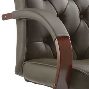  Showing the green wooden padded arm of the chesterfield leather executive chair