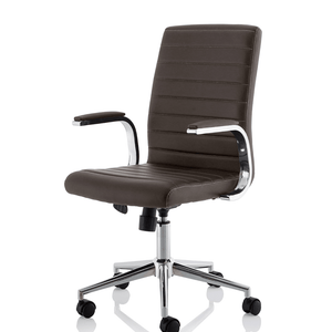 Right angle view of the brown ezra chair with one pice cushioned backrest and seat with padded chrome boomerang style armrests with chrome 5 star base with black castor wheels.