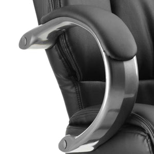 Close up of the black leather padded gun metal armrest .