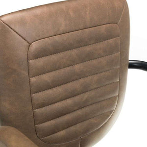 View of the brown faux quilted leather backrest of the gehry  industrial retro home office chair.