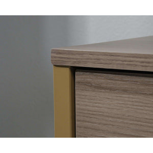 lux diamond ash finish retro style home office desk. close up of the corner of the desk with light brown coated leg.