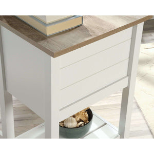 mediterranean shaker style soft white home office. desk close up of  white panel side desk with intel oak accent desktop and shelf at the bottom.