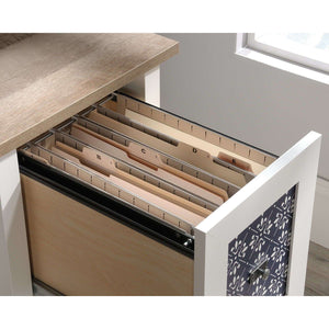 mediterranean shaker style soft white home office desk. close of the deep drawer featuring decorative pattern  has patented t-lock  assembly system can hold letter size hanging files.