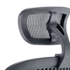 Close up of the countoured adjustable headrest for the mirage ii executive home office chair.