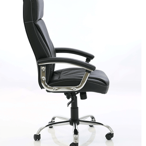 Side view picture of the black leather penza chair with detailed white stitching , paddedchrome armrests and chrome 5 star base with black castor wheels.