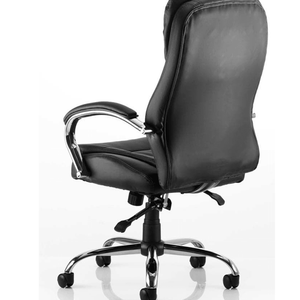 Side view of the back of the black sculpted backrest with padded chrome armrest and padded cushioned seat with chrome 5 star base , with black castor wheels.