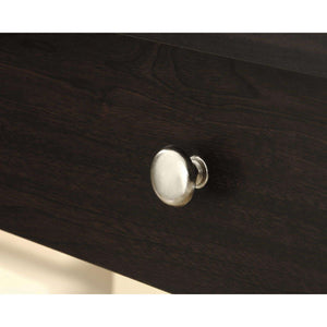 sit-stand home office desk in jamocha wood. close up drawer sliver knob. in jamocha wood finish.