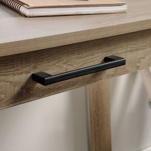 summer oak effect trestle home office desk with stationery drawer. close up of the sleek drawer.