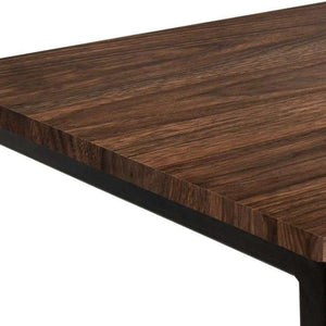 Close up of the walnut desk top of the tribeca contemporary home office desk.